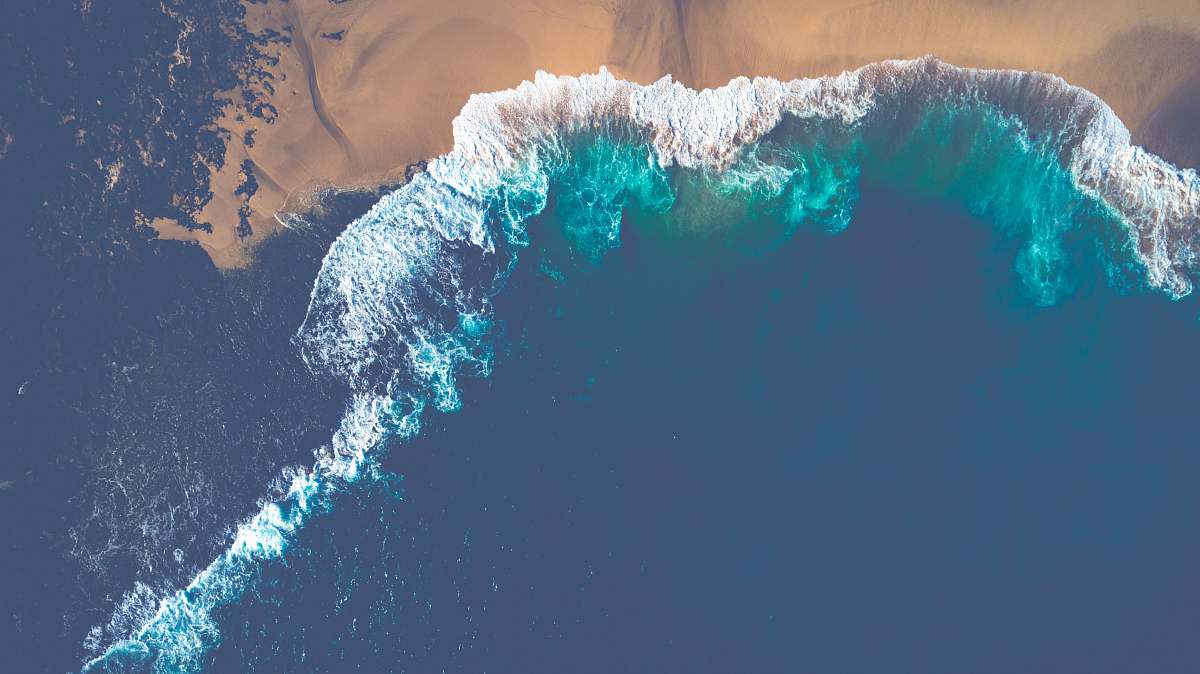 united states aerial view of ocean wave during daytime beach